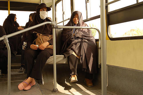 People wearing masks to avoid smog pollution in Tehran, Iran