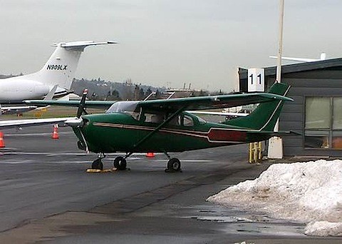 green single-engine aircraft