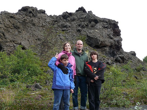 parents with two kids on outdoors