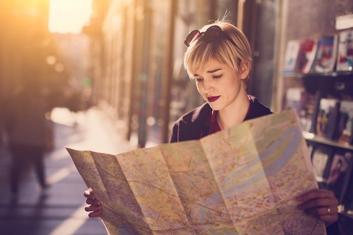 Woman looking at the map